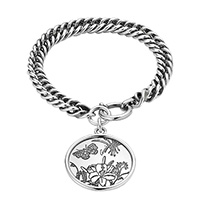 Срібний шарм-браслет Gucci Flora з гравірованою круглою підвіскою, фото