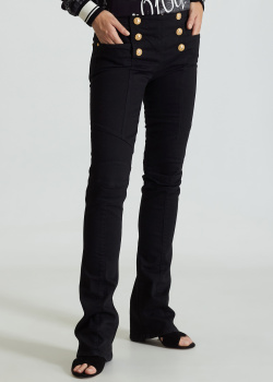 Чорні джинси Balmain із золотистими гудзиками., фото