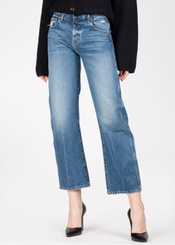 Расклешенные джинсы Khaite с потертостями на карманах, фото