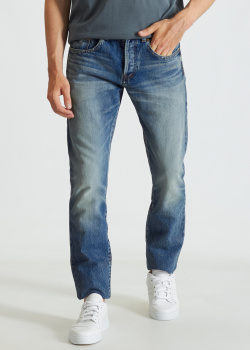 Зауженные джинсы Saint Laurent с потертостями, фото