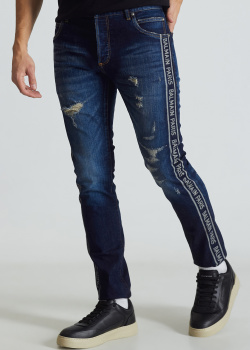 Рваные джинсы Balmain темно-синего цвета, фото