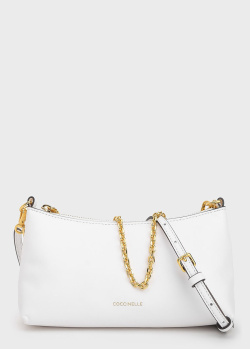 Біла сумка Coccinelle із золотистою фурнітурою, фото